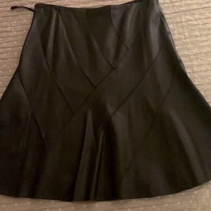 Knee long leather skirt . Full length lining Length 24, waist 16